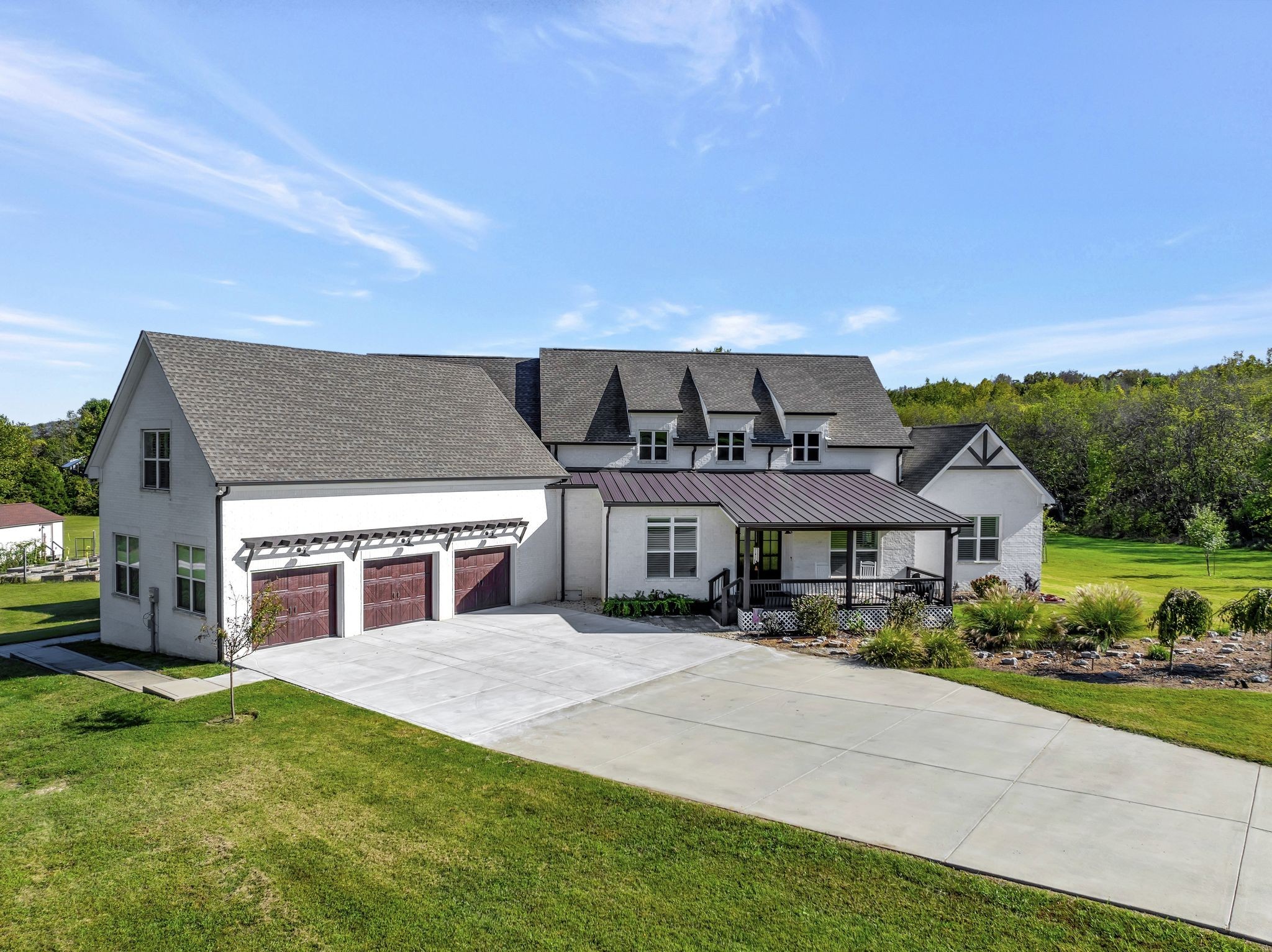 4285 Franklin Road Lebanon, TN 37090 - Photo 2 of 90 a view of a big house with a big yard and large tree