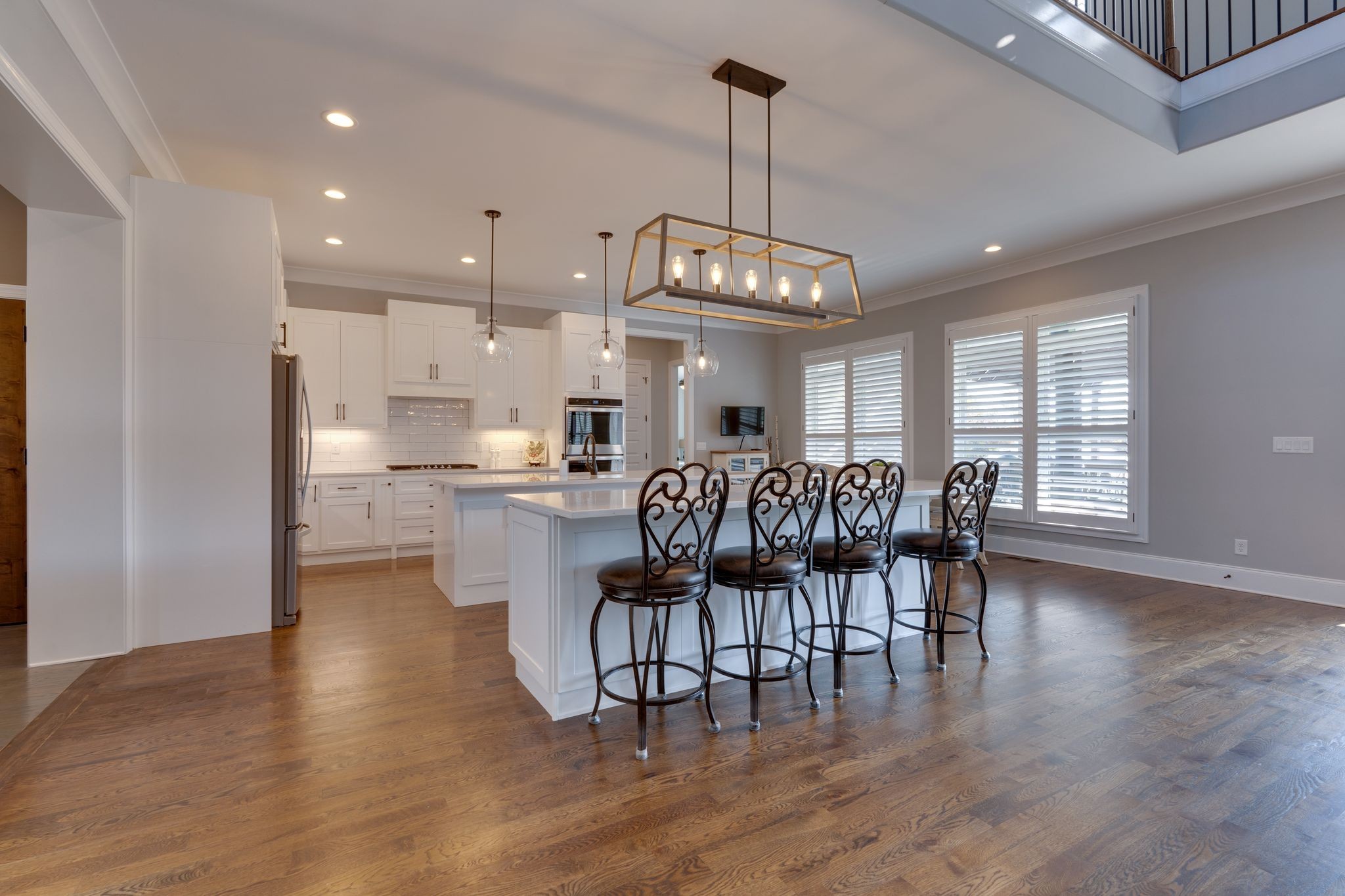 4285 Franklin Road Lebanon, TN 37090 - Photo 24 of 90 a view of a dining room and livingroom with furniture wooden floor a chandelier