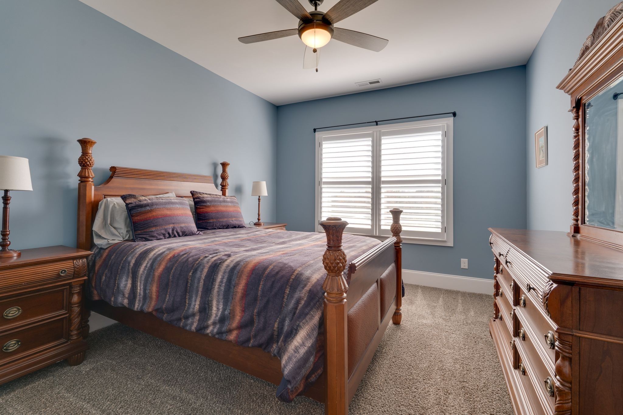 4285 Franklin Road Lebanon, TN 37090 - Photo 52 of 90 a bedroom with a bed and a chandelier