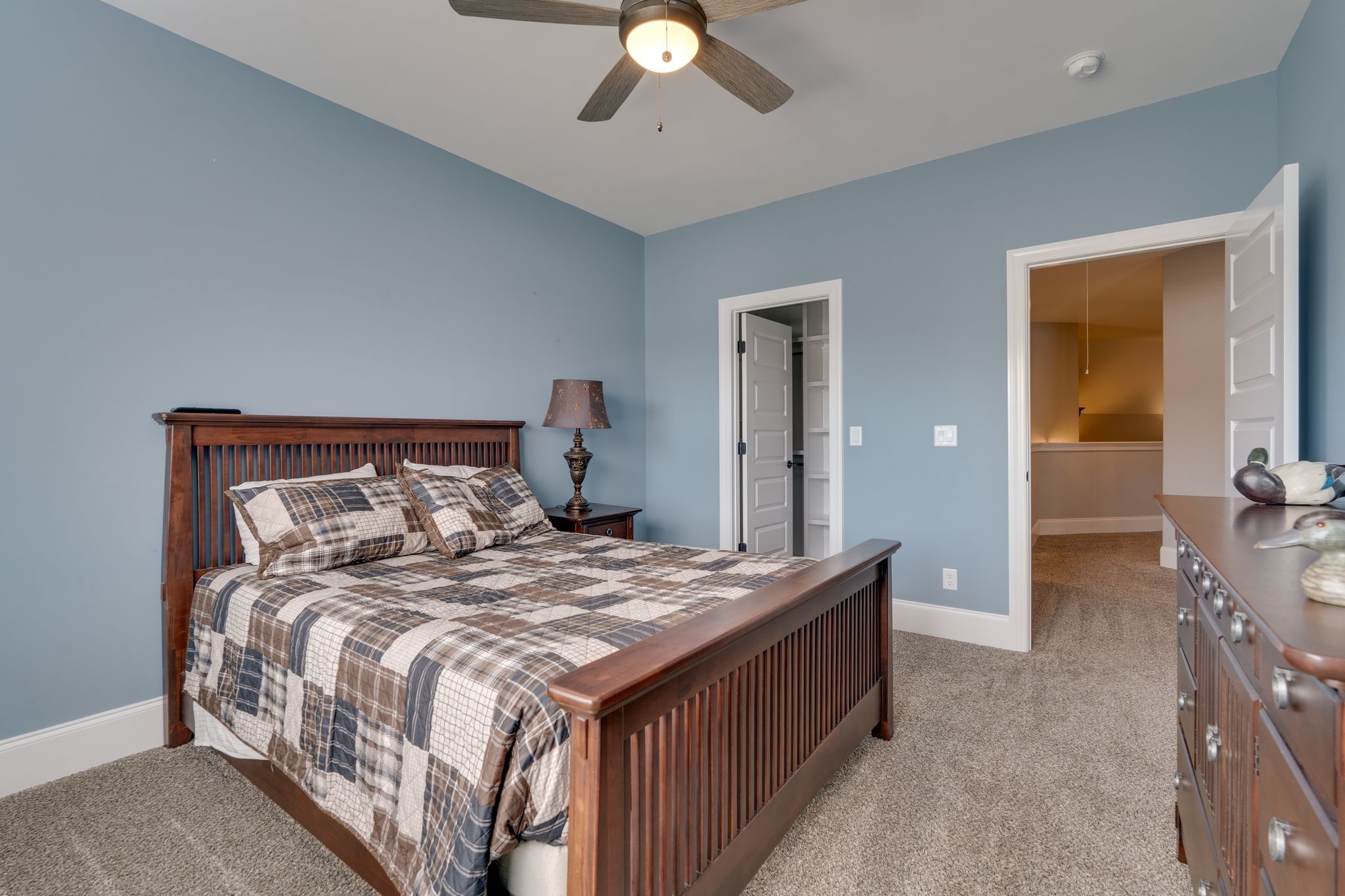 4285 Franklin Road Lebanon, TN 37090 - Photo 54 of 90 a bedroom with a bed and a chandelier