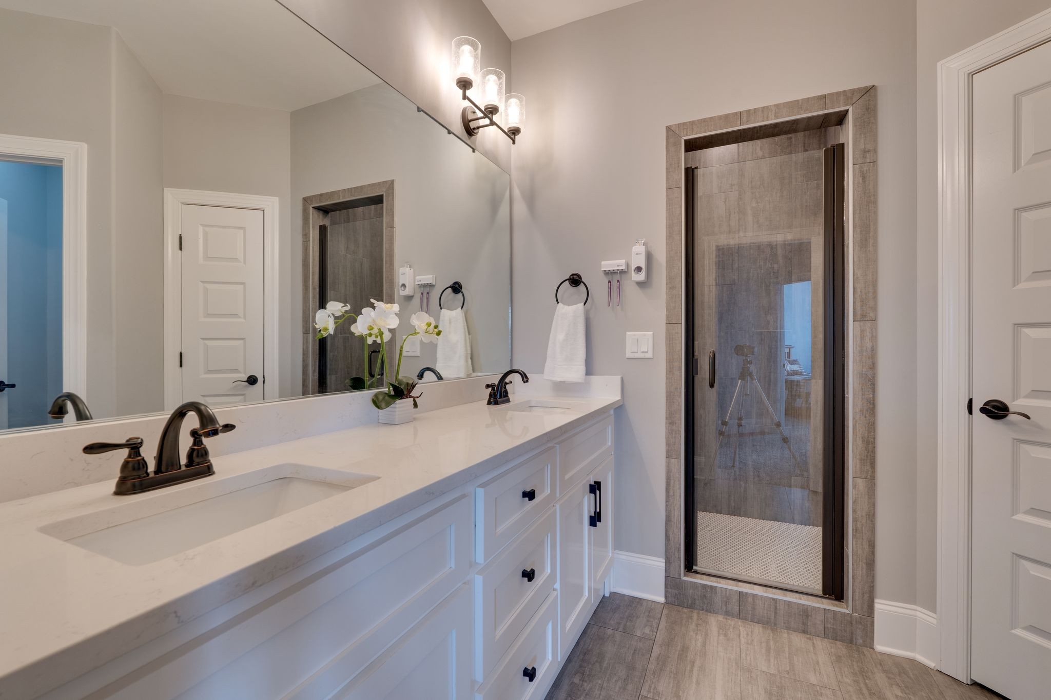 4285 Franklin Road Lebanon, TN 37090 - Photo 57 of 90 a bathroom with a double vanity sink a mirror and shower