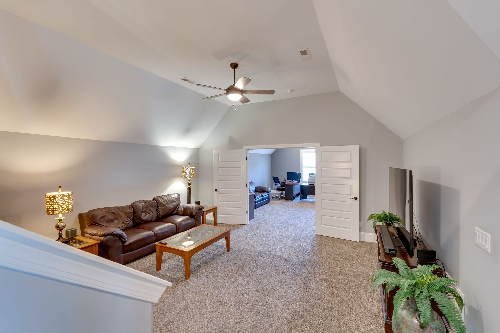 4285 Franklin Road Lebanon, TN 37090 - Photo 58 of 90 a living room with furniture a chandelier fan and a window