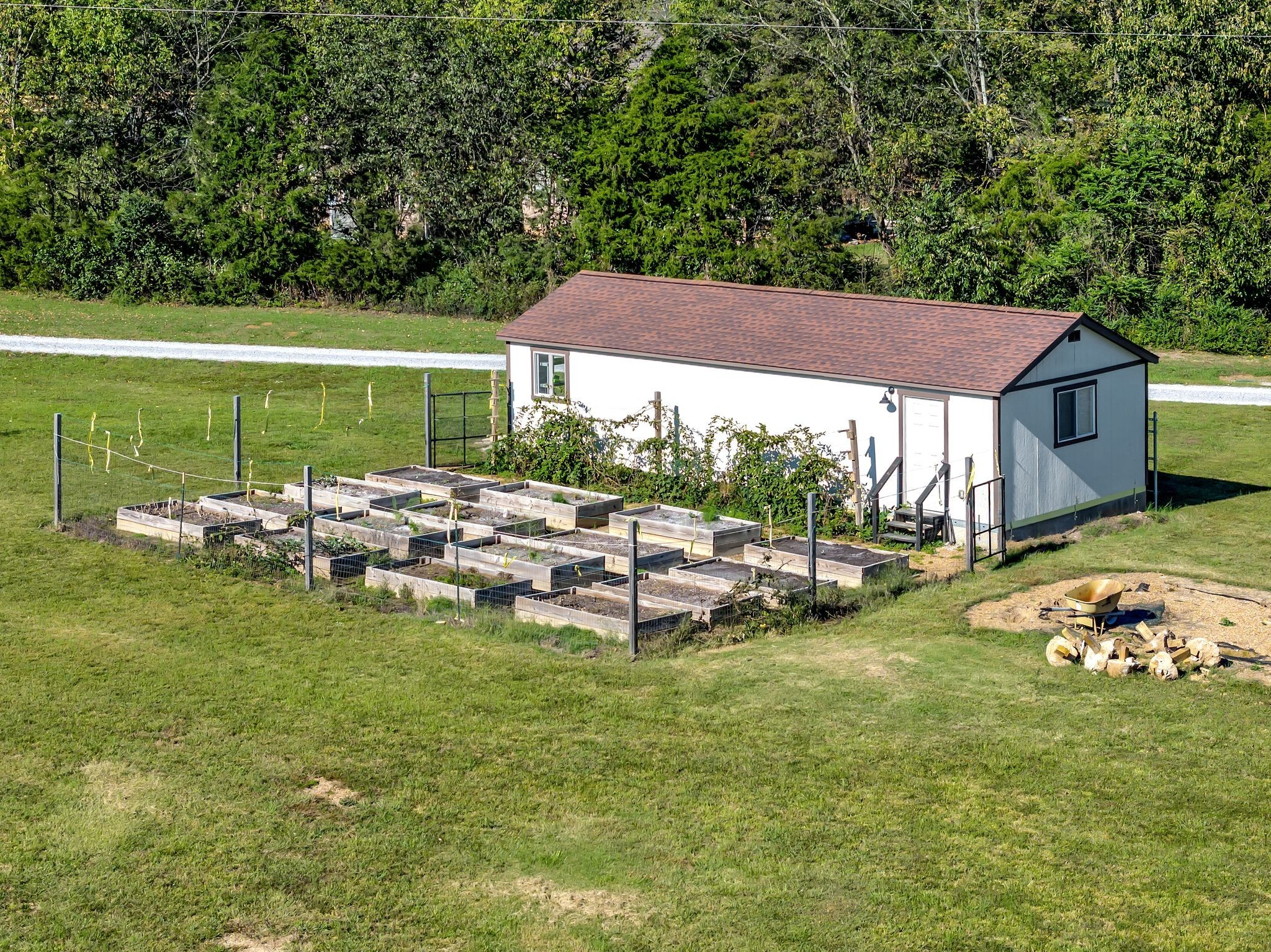 4285 Franklin Road Lebanon, TN 37090 - Photo 74 of 90 a view of a backyard with table and chairs under an umbrella