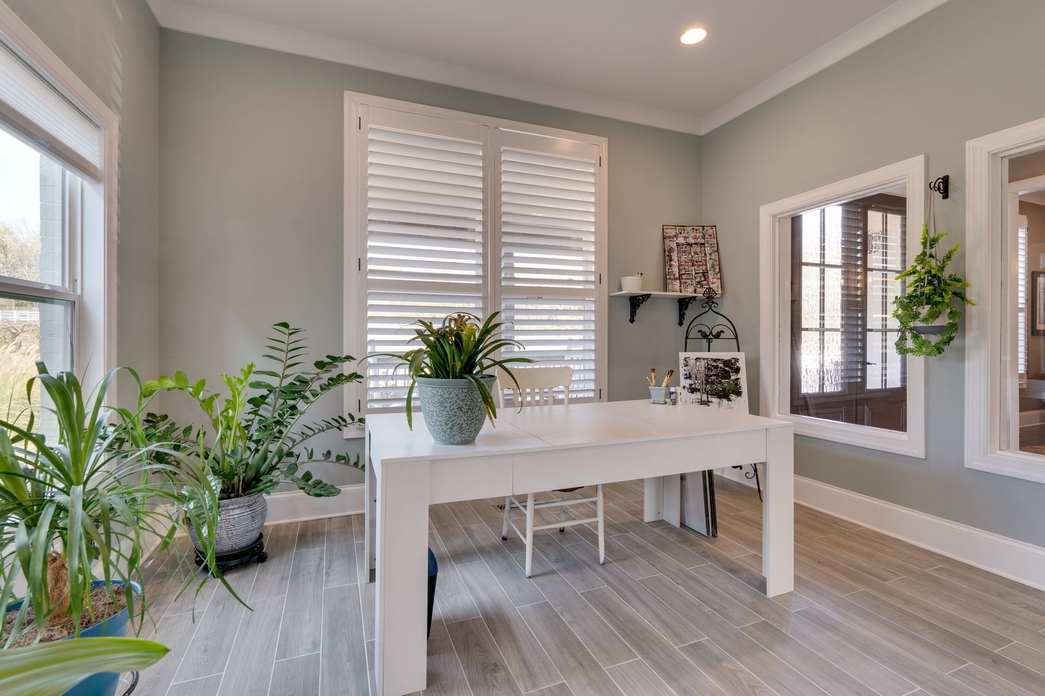 4285 Franklin Road Lebanon, TN 37090 - Photo 9 of 90 a dining room with furniture potted plants and wooden floor