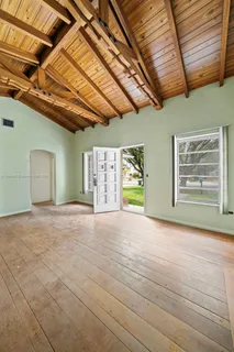 a view of empty room with windows