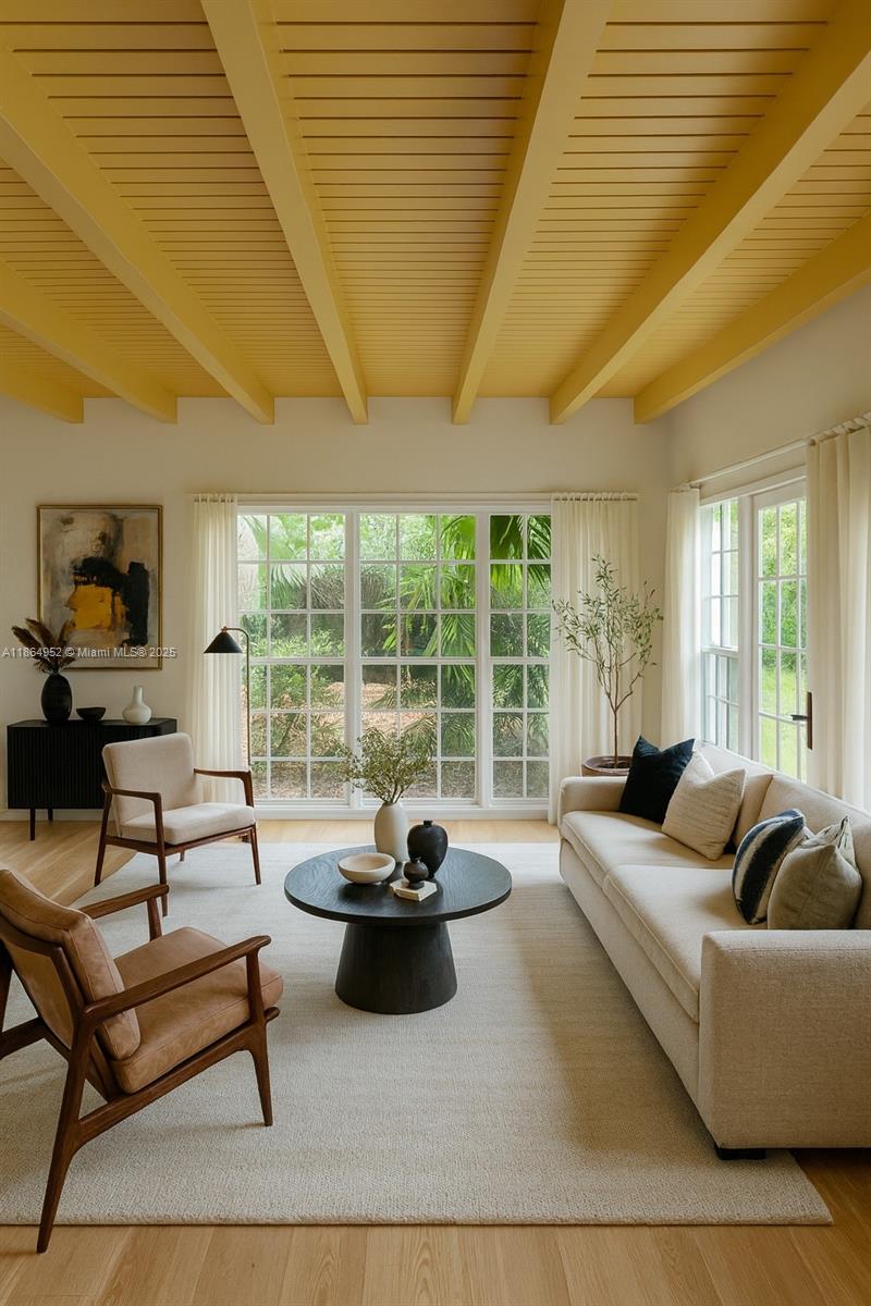 531 Northeast 55th Terrace Miami, FL 33137 - Photo 7 of 15 a living room with furniture and a large window