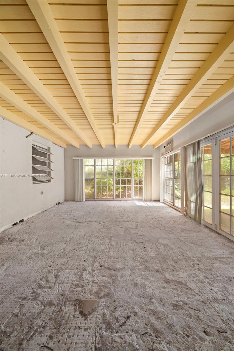 531 Northeast 55th Terrace Miami, FL 33137 - Photo 8 of 15 a view of an empty room with a window