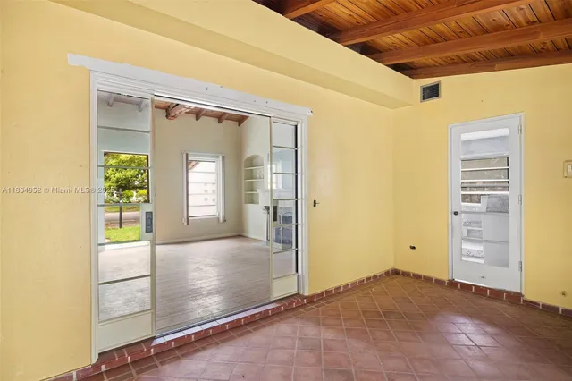 an empty room with windows