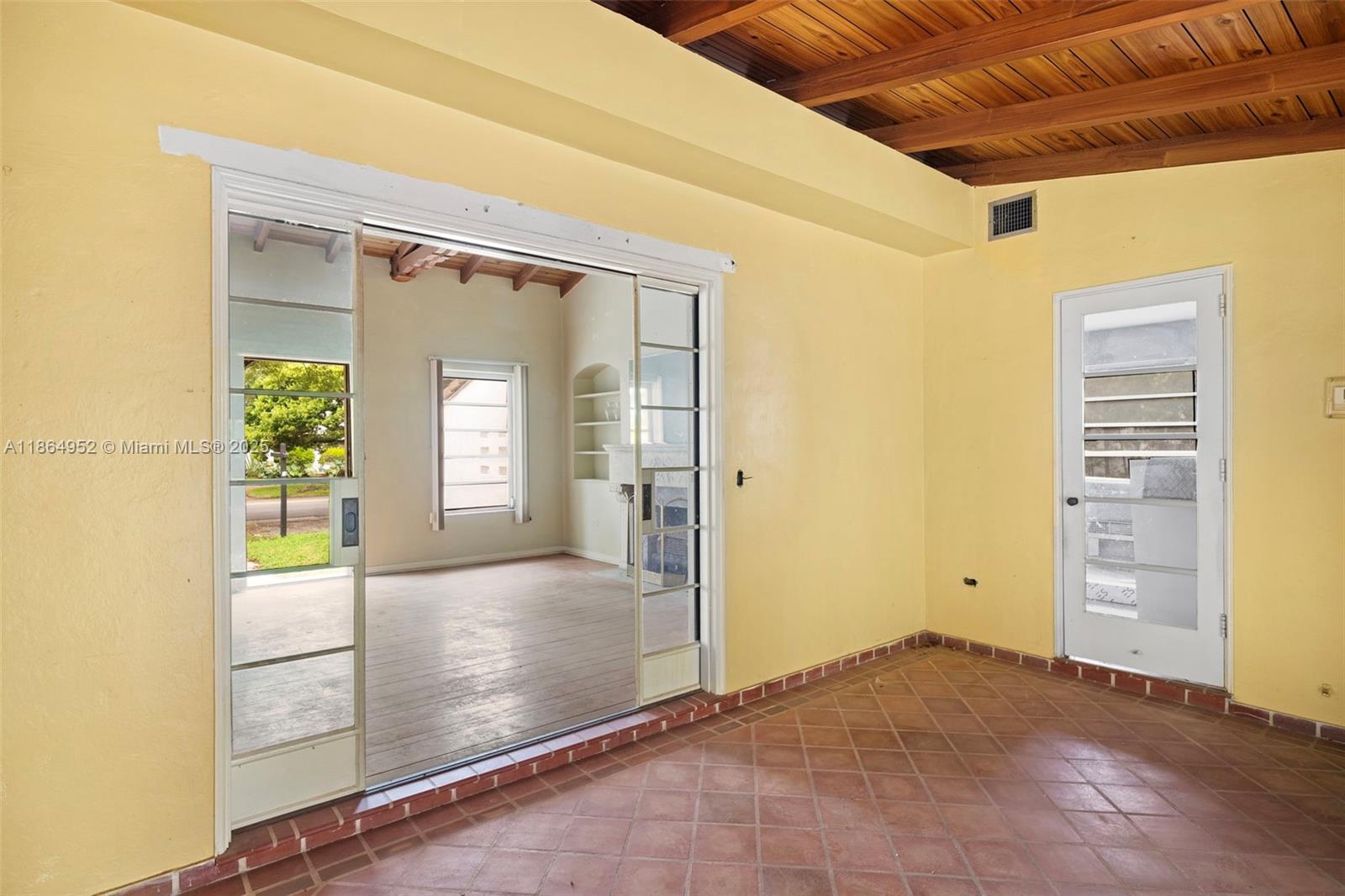 531 Northeast 55th Terrace Miami, FL 33137 - Photo 10 of 15 an empty room with windows