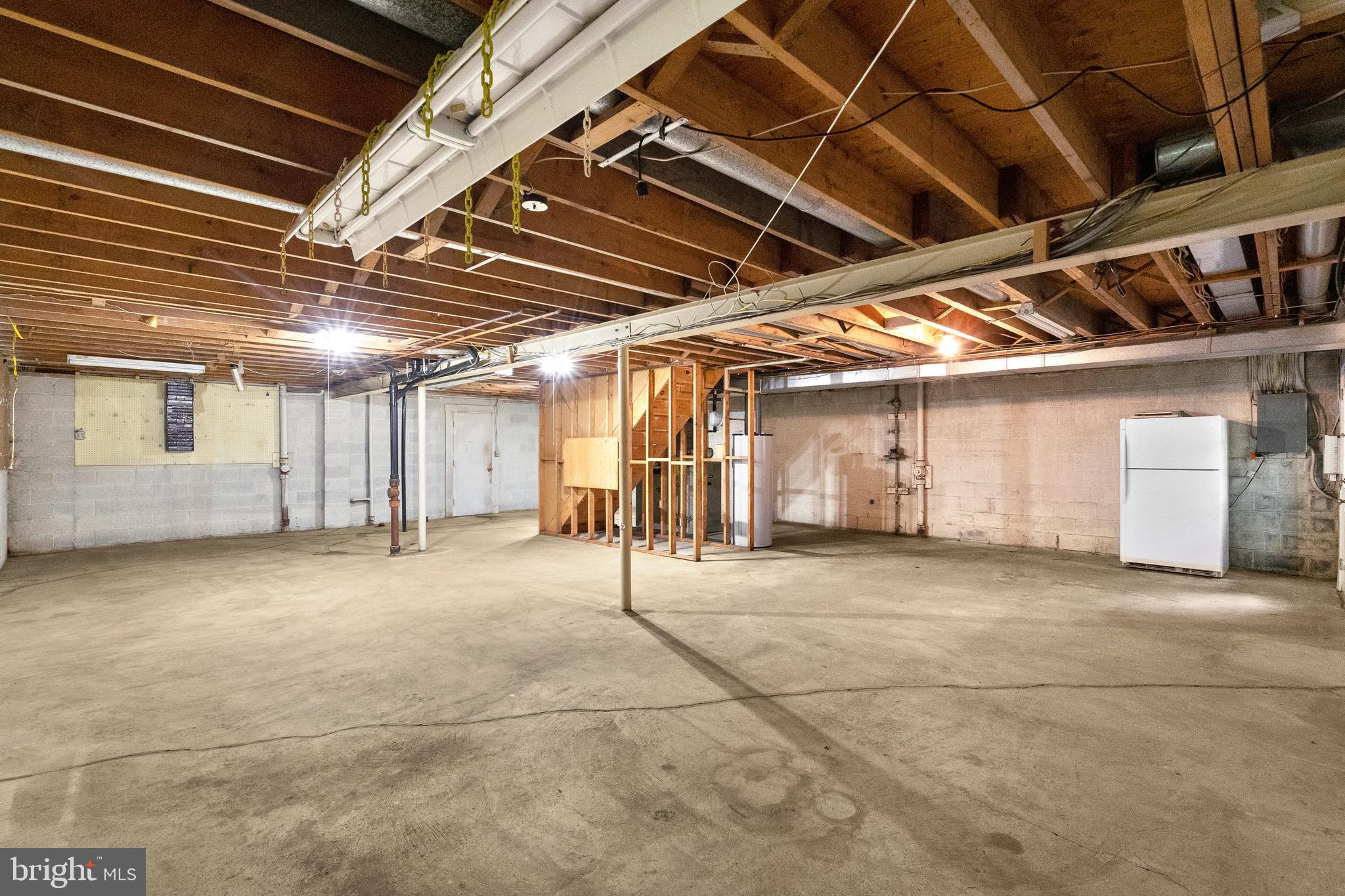 9509 Emory Grove Road Gaithersburg, MD 20877 - Photo 49 of 57 a view of an empty room with a garage