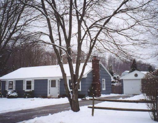7 Diamond Road Danbury, CT 06811 - Photo 1 of 1 a front view of house with yard and trees around