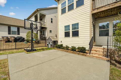 a view of a back yard of the house