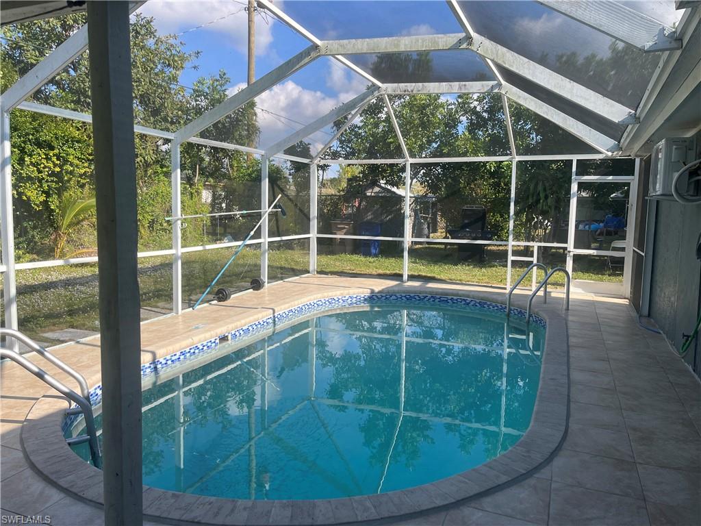 a view of outdoor space with swimming pool