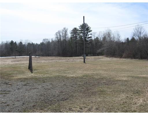 21 6 Rod Road Fairfield, ME 04937 - Photo 13 of 14 Yard/Garden. Side yard