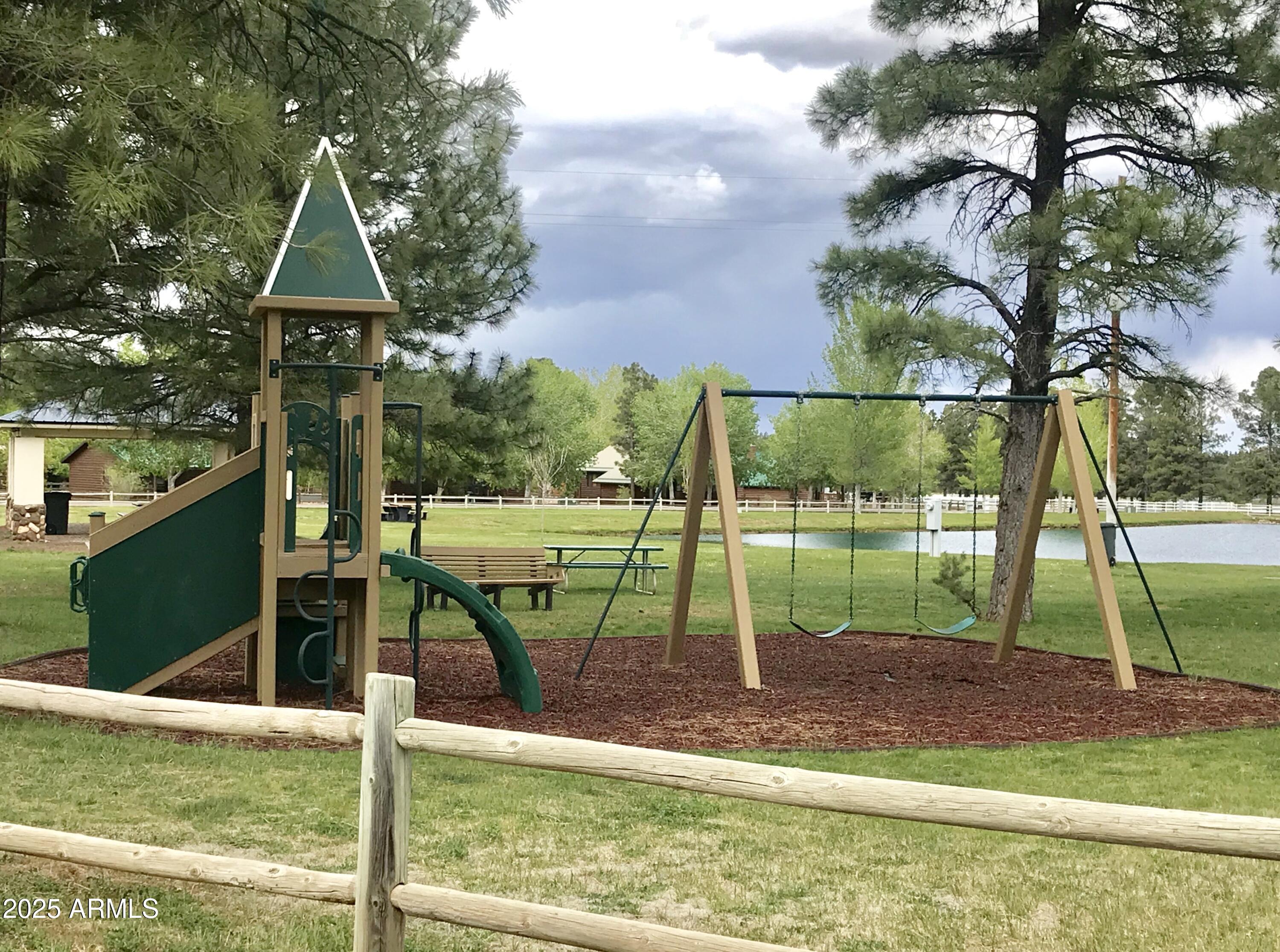 2344 South Buffalo Loop Overgaard, AZ 85933 - Photo 39 of 48 CHILDRENS PLAYGROUND