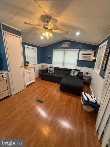 a kitchen with a sink appliances and cabinets