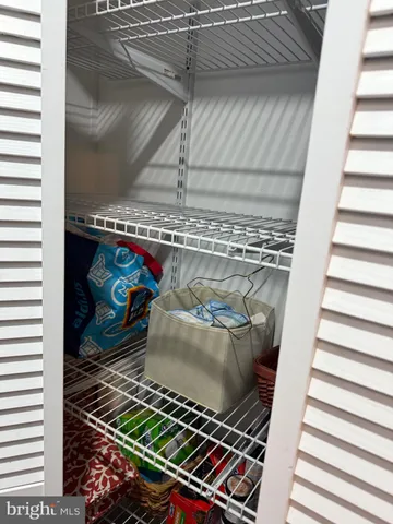 a view of a utility room with a fireplace