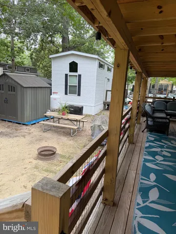 a view of a balcony with chairs