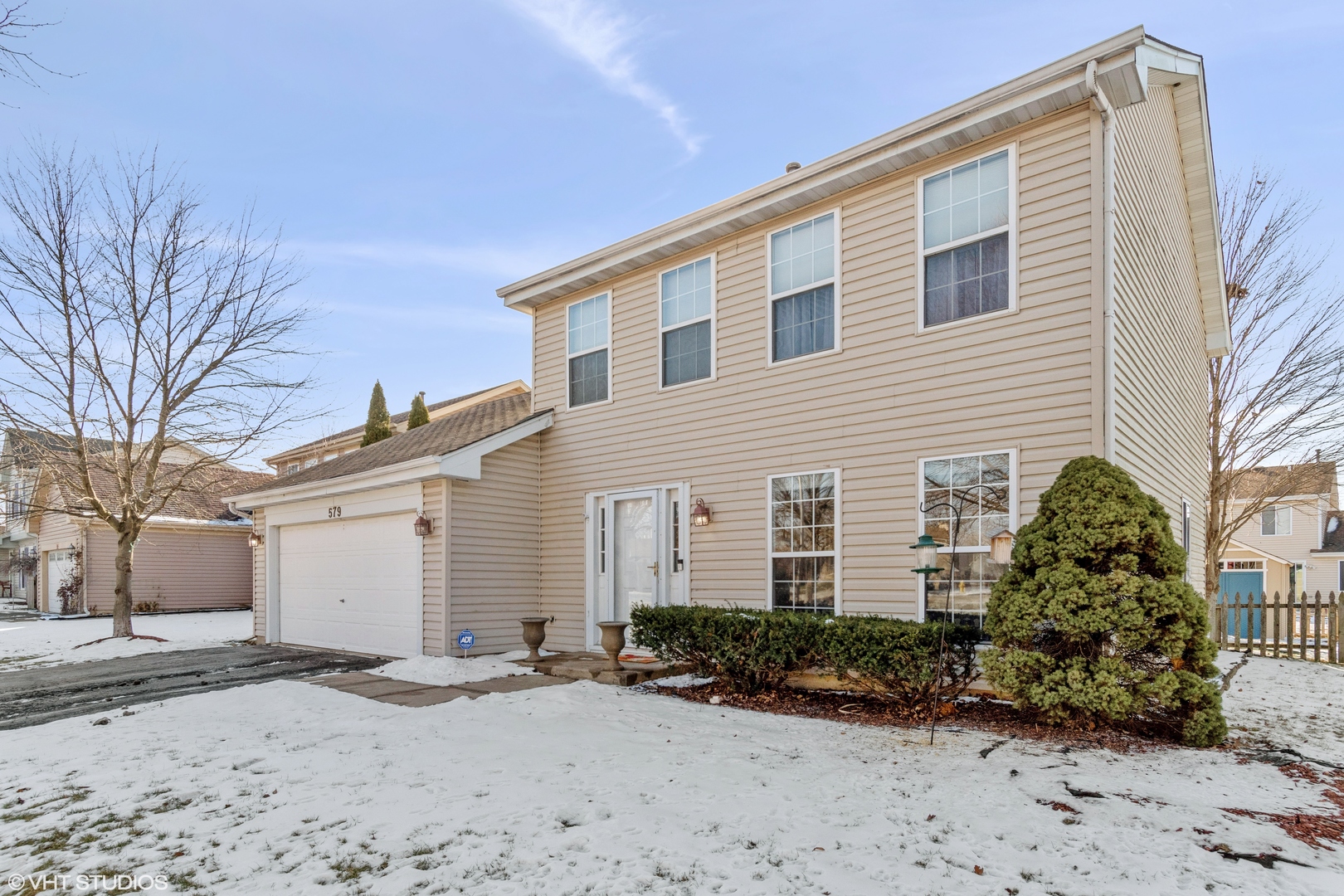 579 Buckboard Road Bolingbrook, IL 60490 - Photo 1 of 17 a front view of a house with a yard