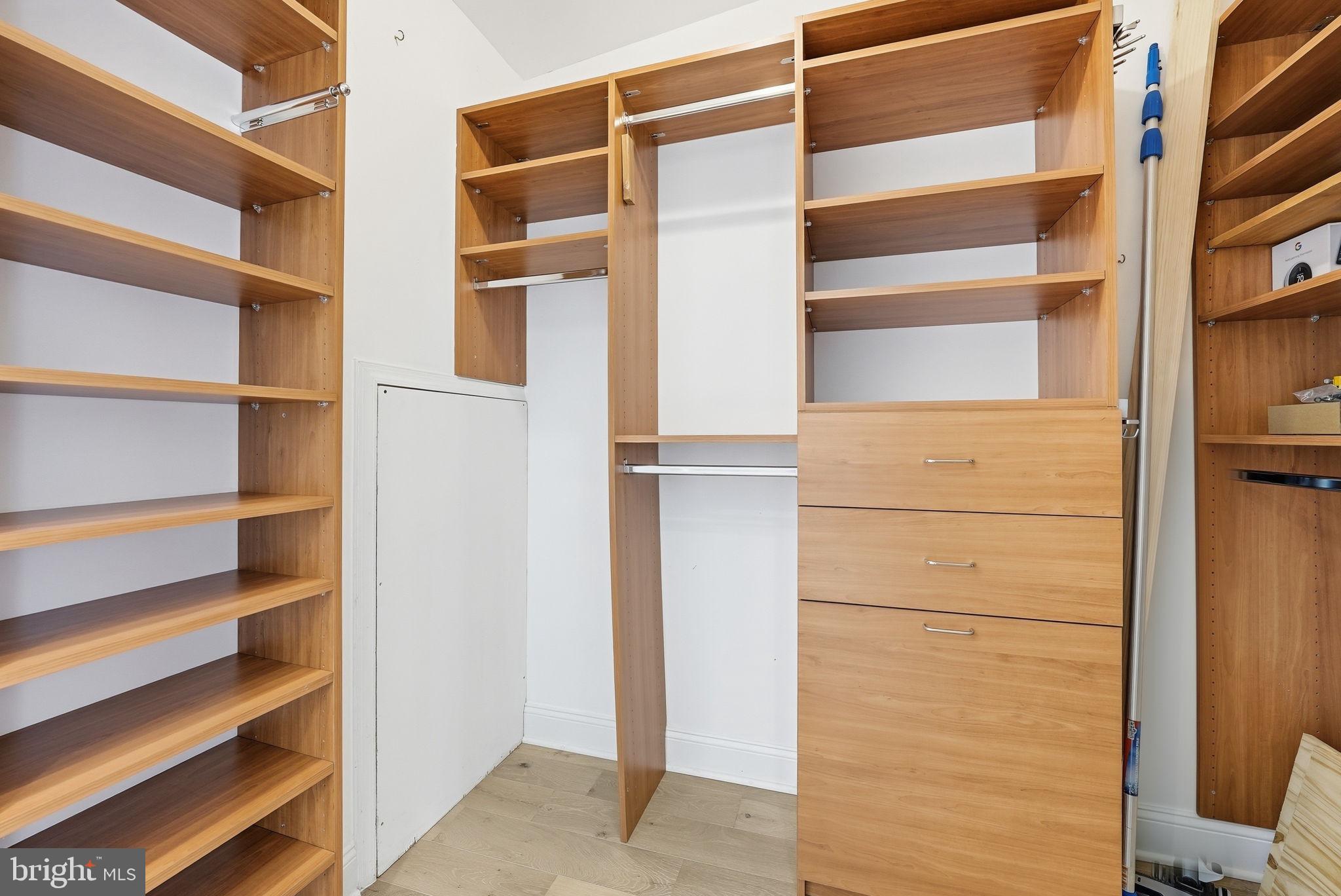 2713 Ontario Road Northwest, Unit 5 Washington, DC 20009 - Photo 26 of 35 a view of walk in closet with empty racks