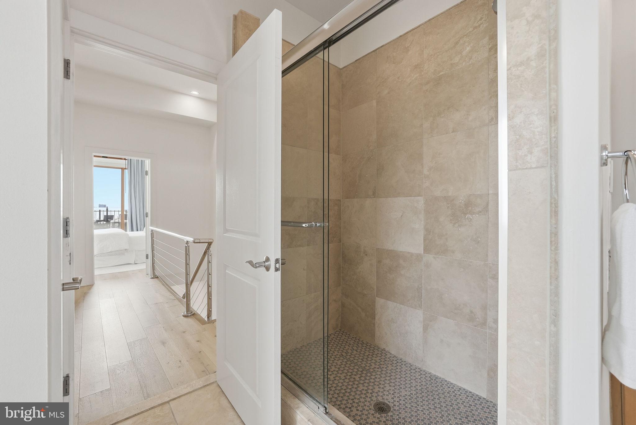 2713 Ontario Road Northwest, Unit 5 Washington, DC 20009 - Photo 28 of 35 a bathroom with a shower and a sink