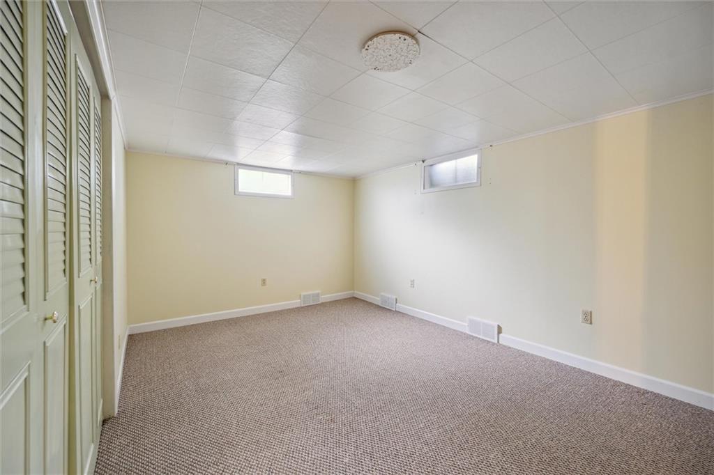 1662 Freeport Road Kittanning, PA 16201 - Photo 24 of 43 an empty room with a empty space and windows