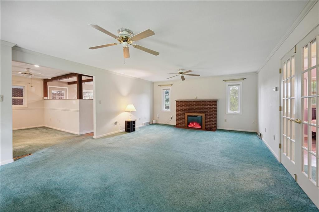 1662 Freeport Road Kittanning, PA 16201 - Photo 8 of 43 a living room with furniture and a fireplace