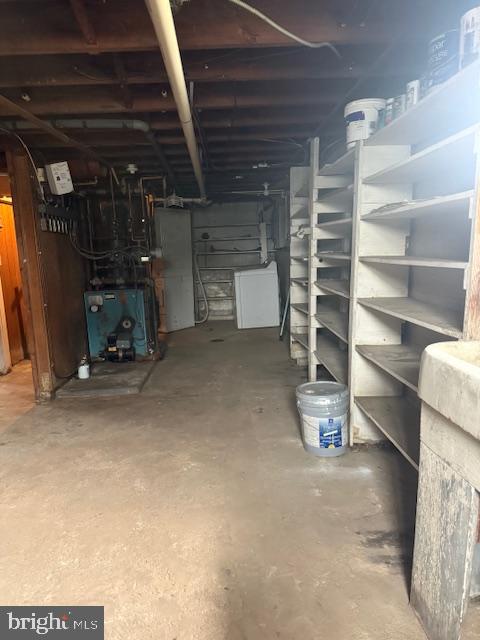 418 Church Street New Windsor, MD 21776 - Photo 16 of 20 a view of an empty room with a fireplace