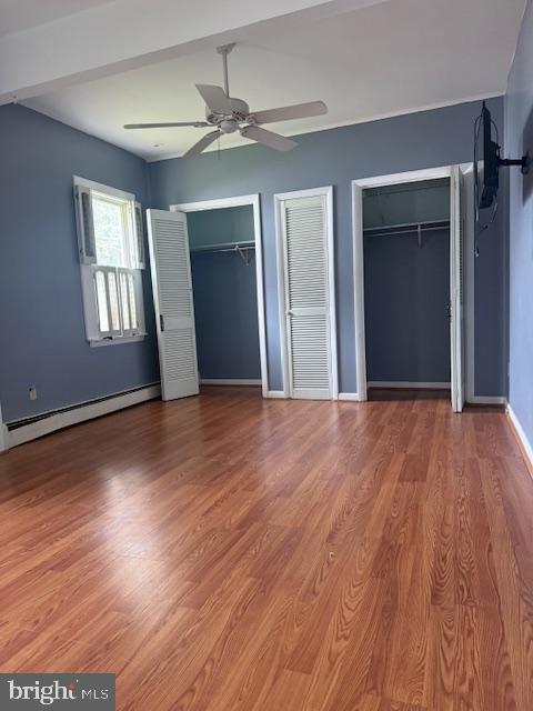 418 Church Street New Windsor, MD 21776 - Photo 10 of 20 a view of an empty room with wooden floor and a window