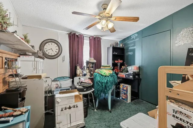 a view of hall way with furniture