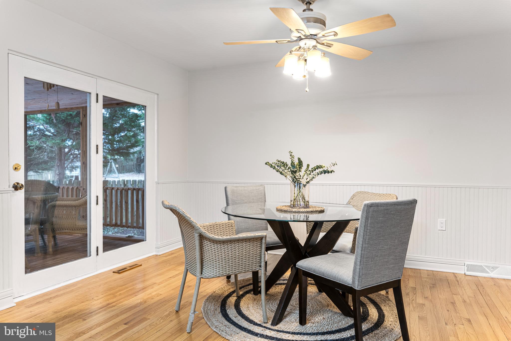 125 Pinecrest Drive Annapolis, MD 21403 - Photo 16 of 69 a view of a dining room with furniture window and wooden floor