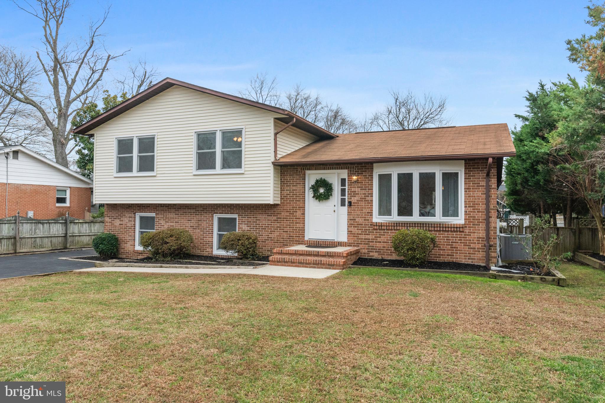 125 Pinecrest Drive Annapolis, MD 21403 - Photo 50 of 69 a front view of a house with a yard