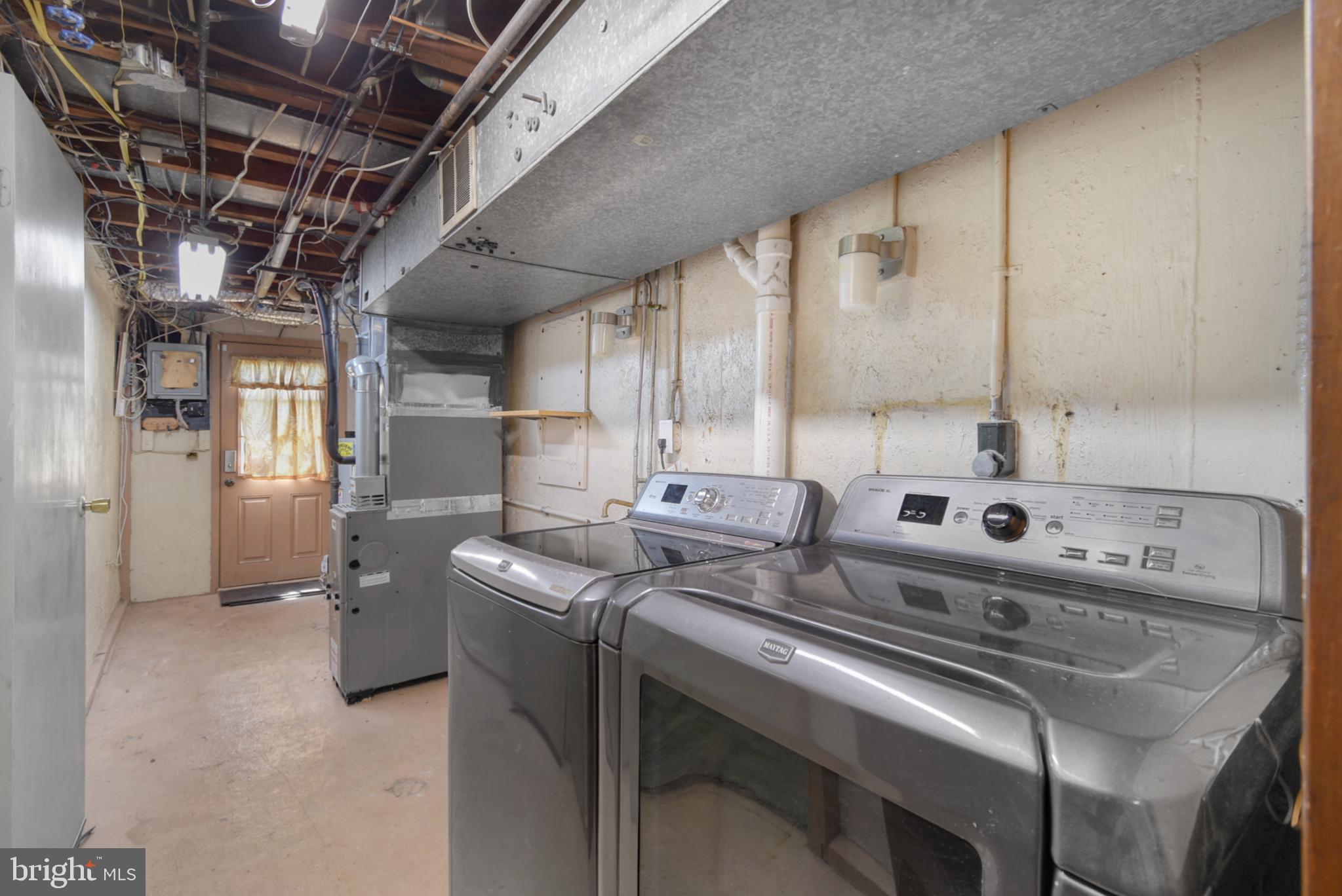 666 Rively Avenue Glenolden, PA 19036 - Photo 12 of 15 a utility room with dryer and washer