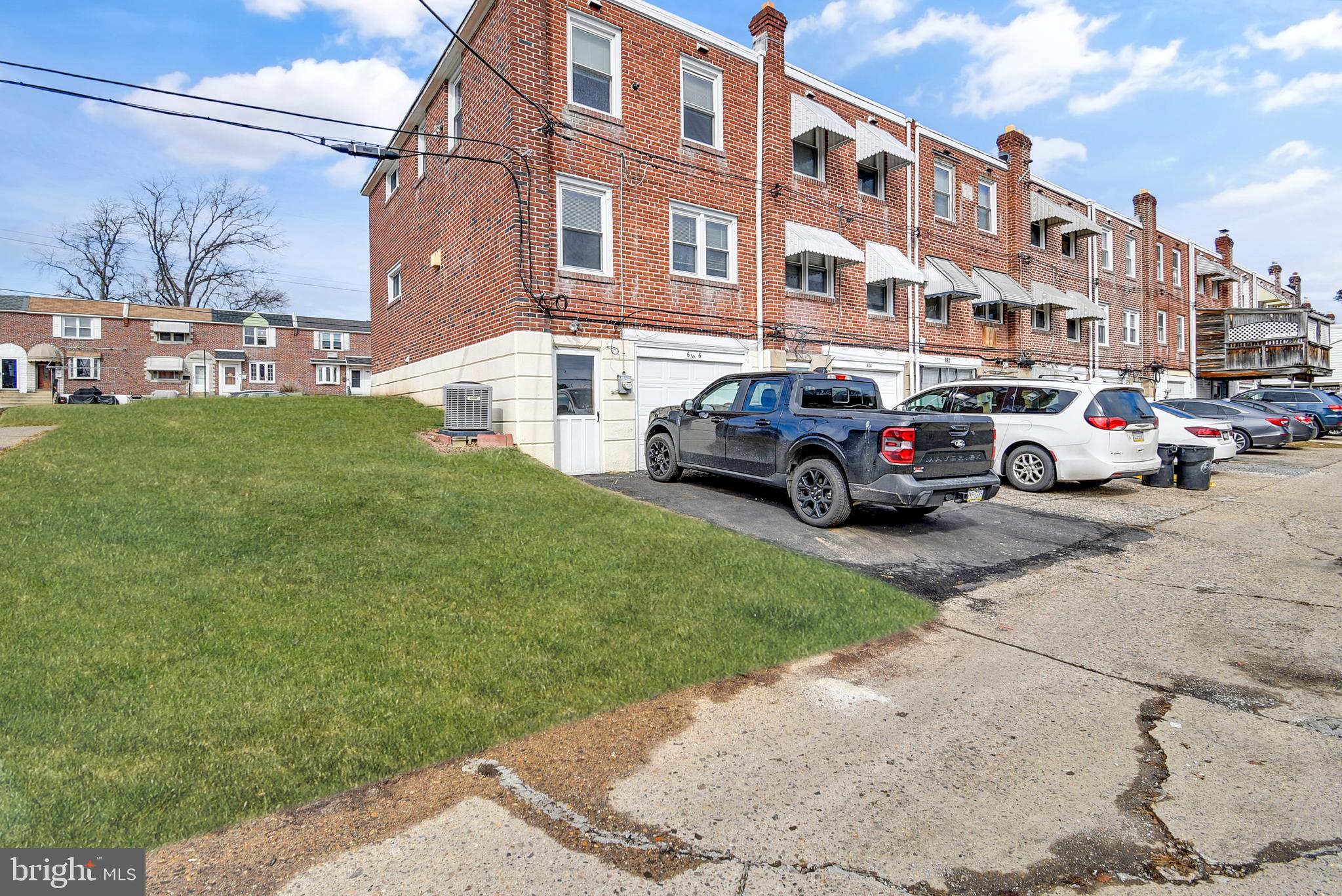 666 Rively Avenue Glenolden, PA 19036 - Photo 14 of 15 a car parked in front of a building