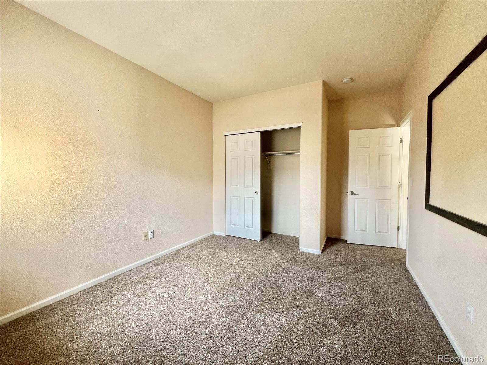 1385 South Chambers Road, Unit 102 Aurora, CO 80017 - Photo 14 of 20 a view of an empty room