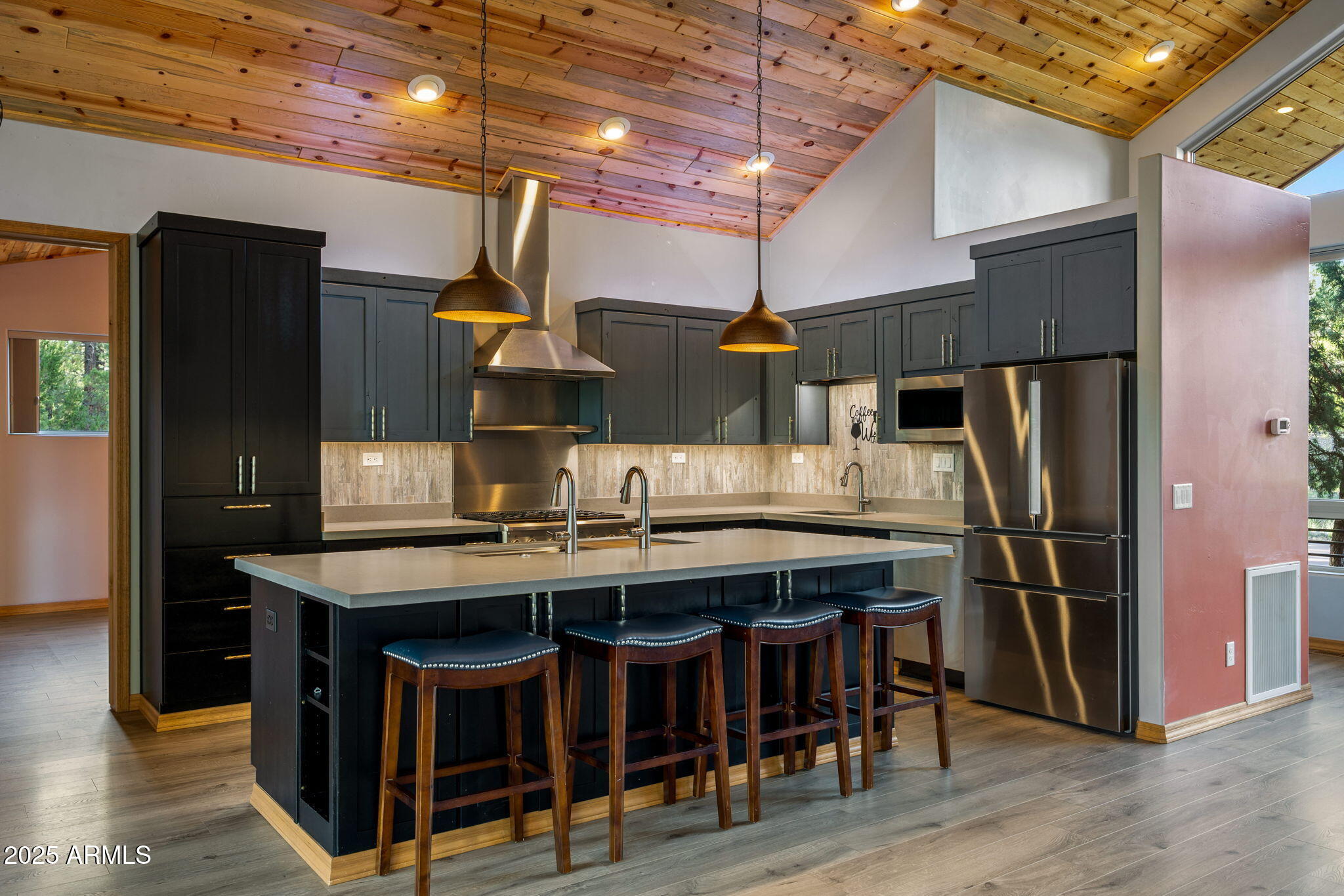 3429 Ponderosa Loop Heber, AZ 85928 - Photo 18 of 75 a kitchen with a wooden floor and refrigerator