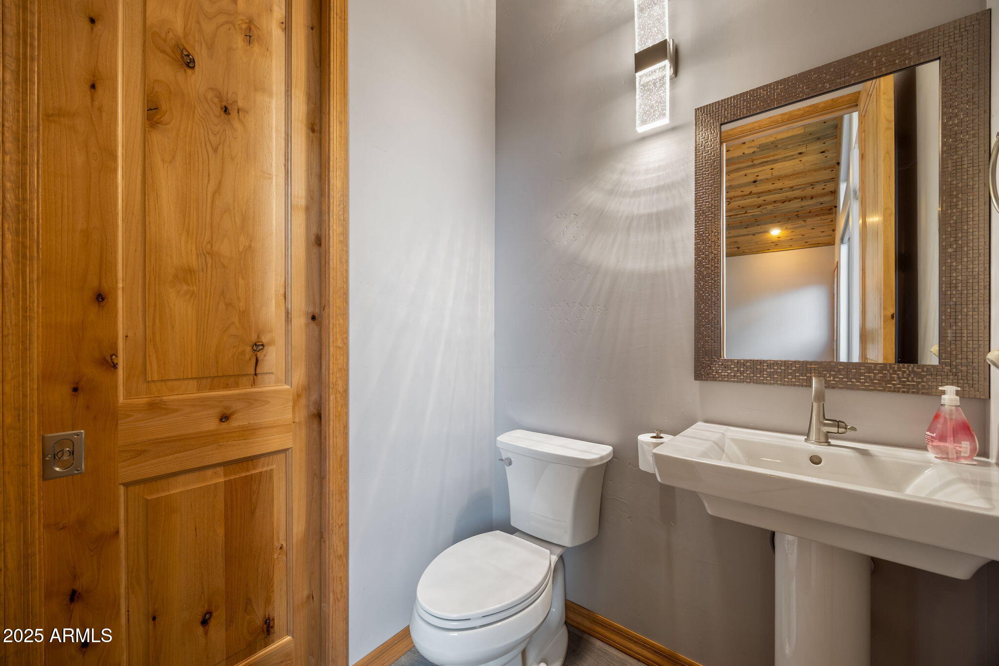 3429 Ponderosa Loop Heber, AZ 85928 - Photo 23 of 75 a bathroom with a sink a toilet and shower