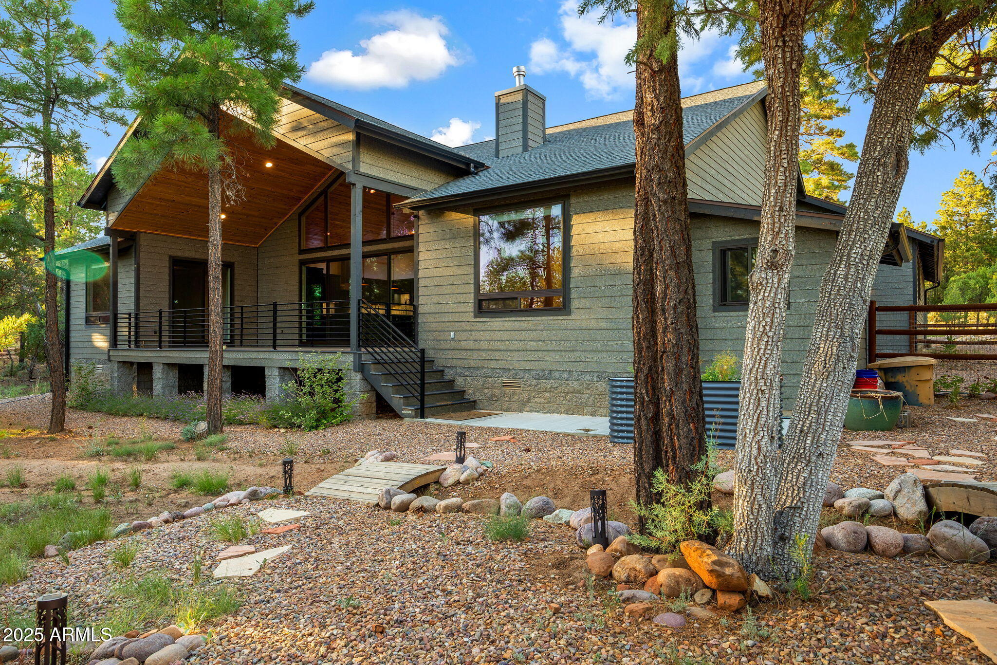 3429 Ponderosa Loop Heber, AZ 85928 - Photo 53 of 75 a view of a brick house with plants