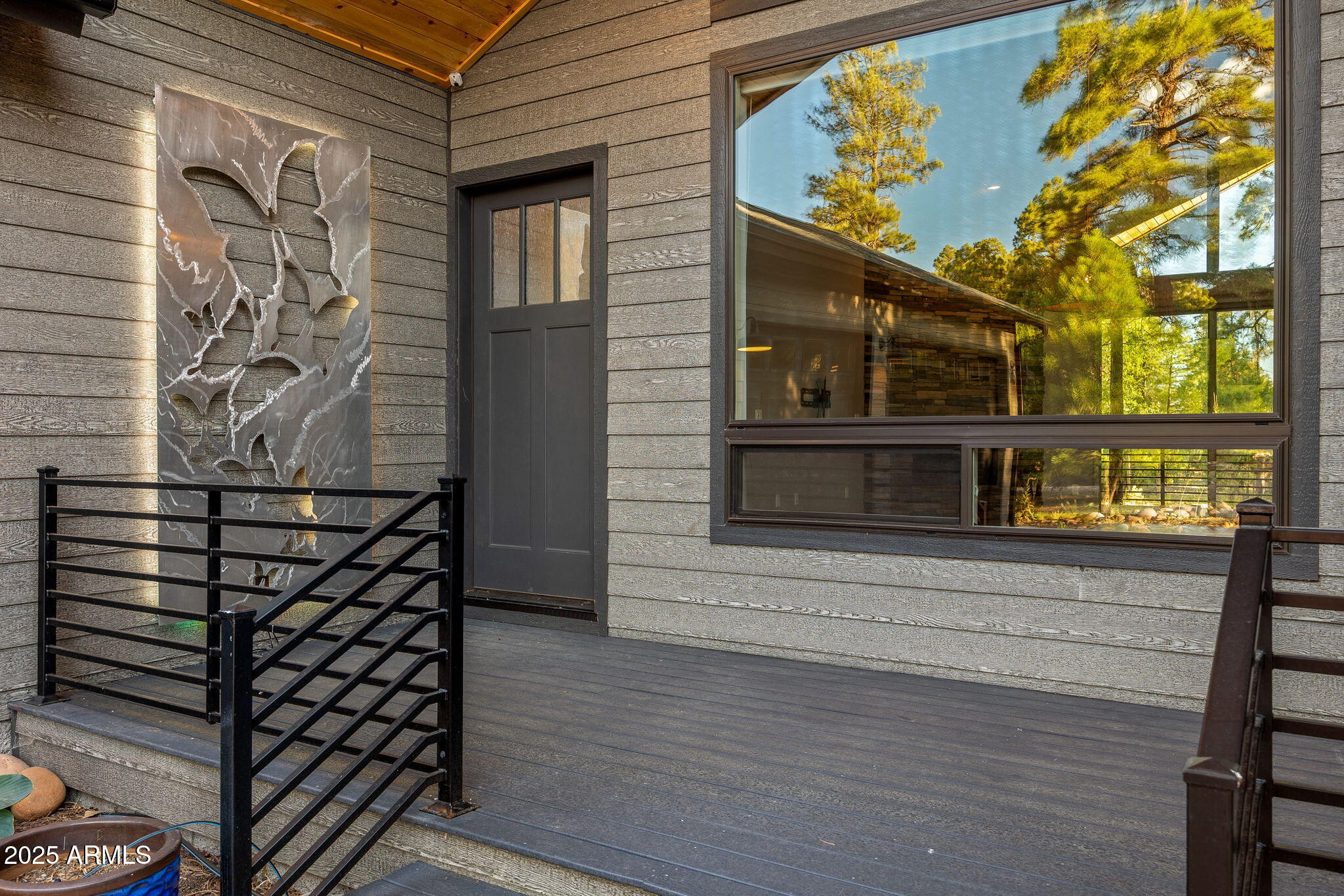 3429 Ponderosa Loop Heber, AZ 85928 - Photo 10 of 75 a view of a brick house with a large window