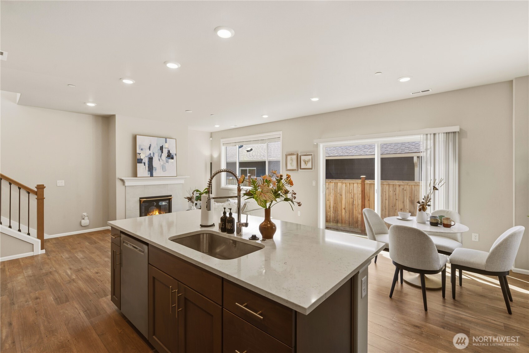 19432 9th Avenue Southeast Bothell, WA 98012 - Photo 11 of 33 a kitchen with counter space dining table and chairs