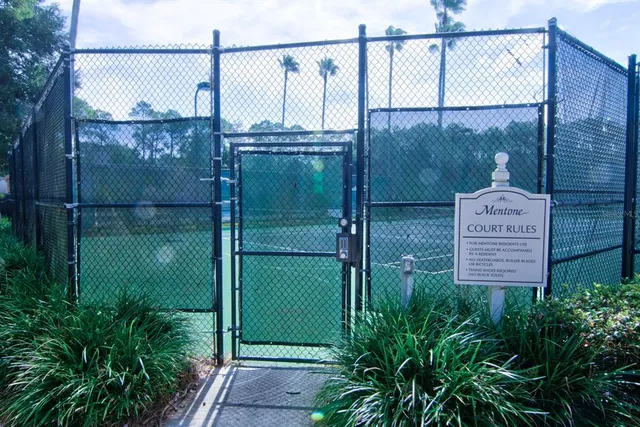 an aerial view of a house with outdoor space and street view