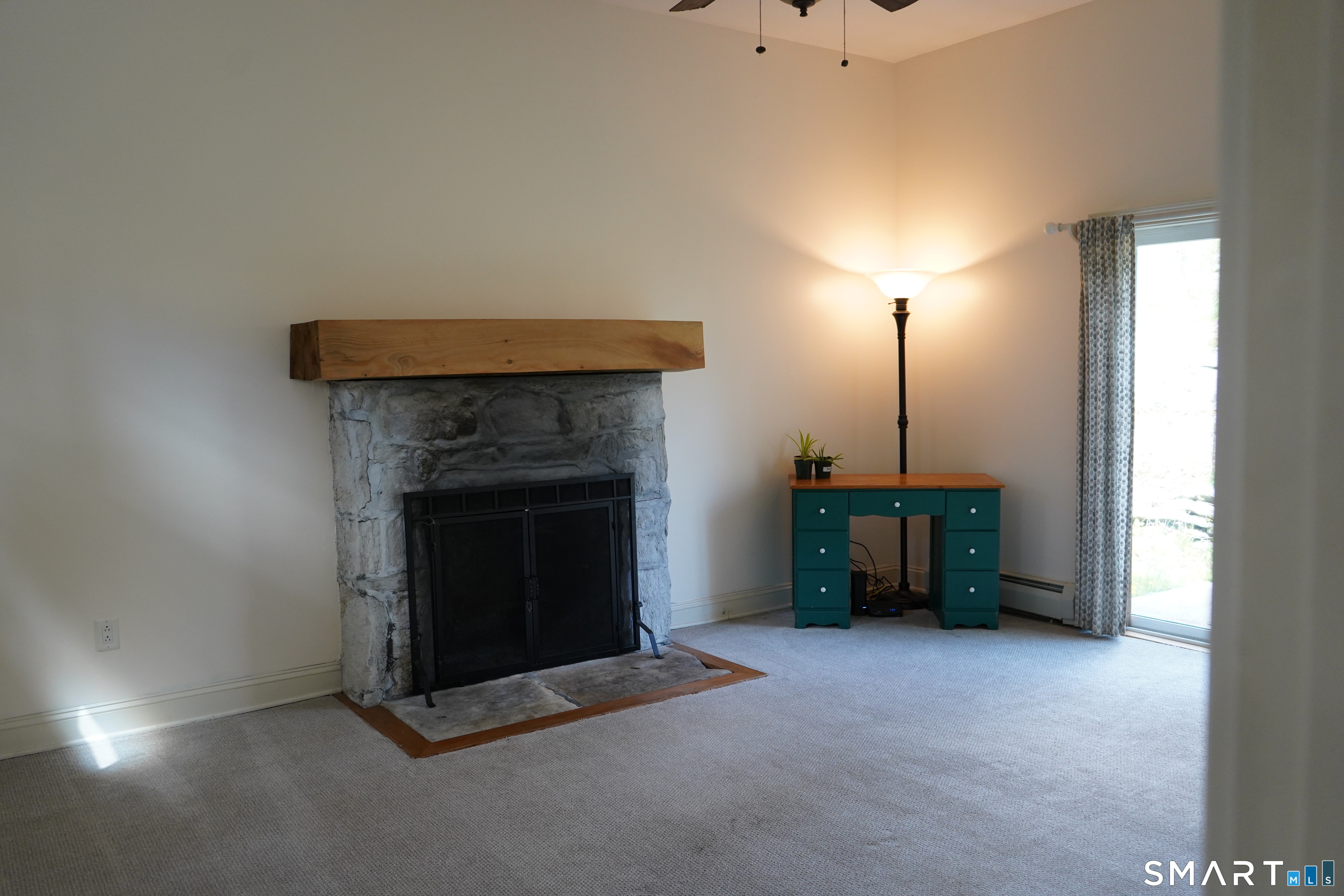 437 Providence Turnpike Hampton, CT 06247 - Photo 11 of 39 a living room with furniture and a fireplace