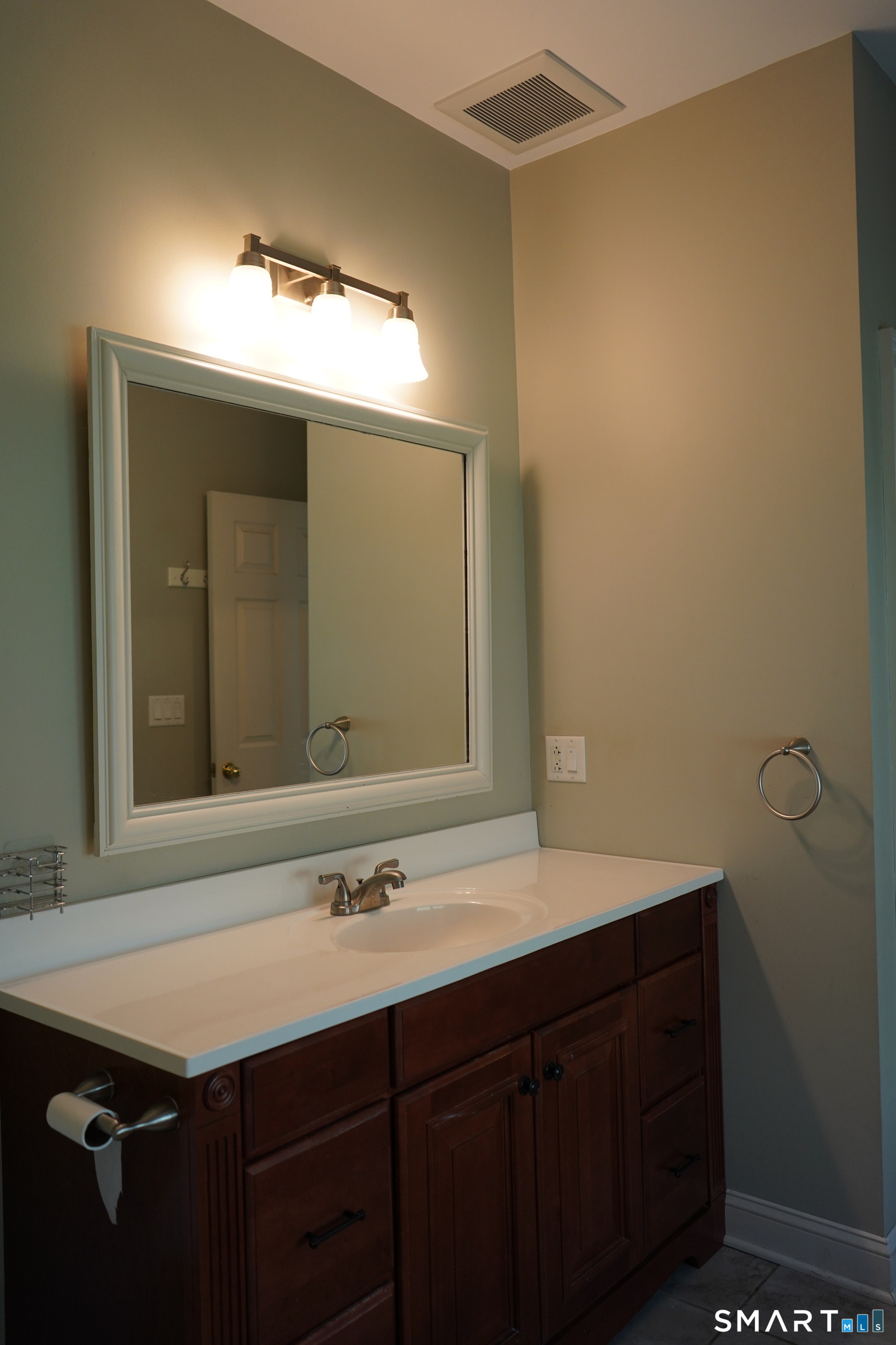 437 Providence Turnpike Hampton, CT 06247 - Photo 16 of 39 a bathroom with a sink and a mirror