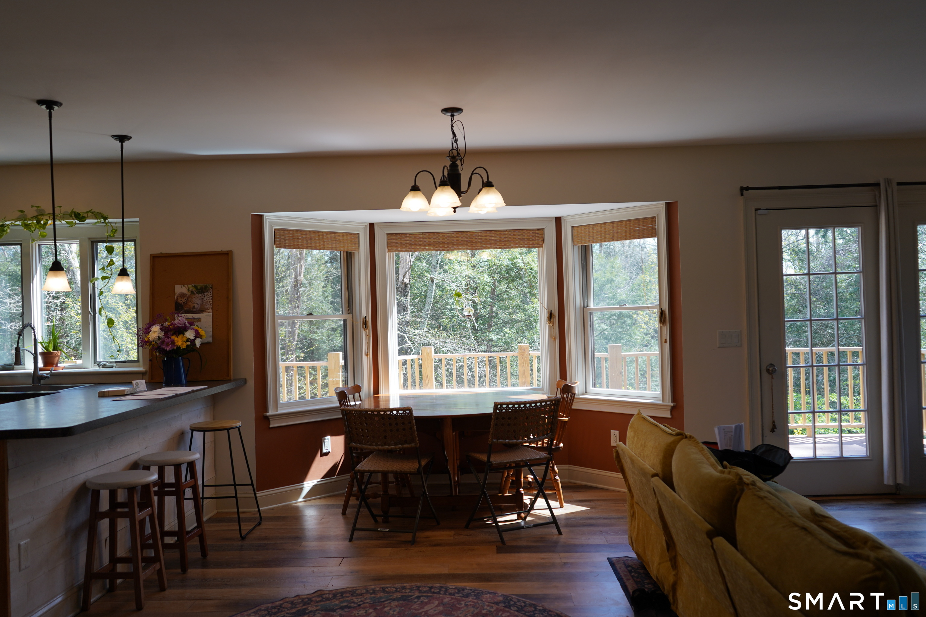 437 Providence Turnpike Hampton, CT 06247 - Photo 8 of 39 a dining room with furniture window wooden floor