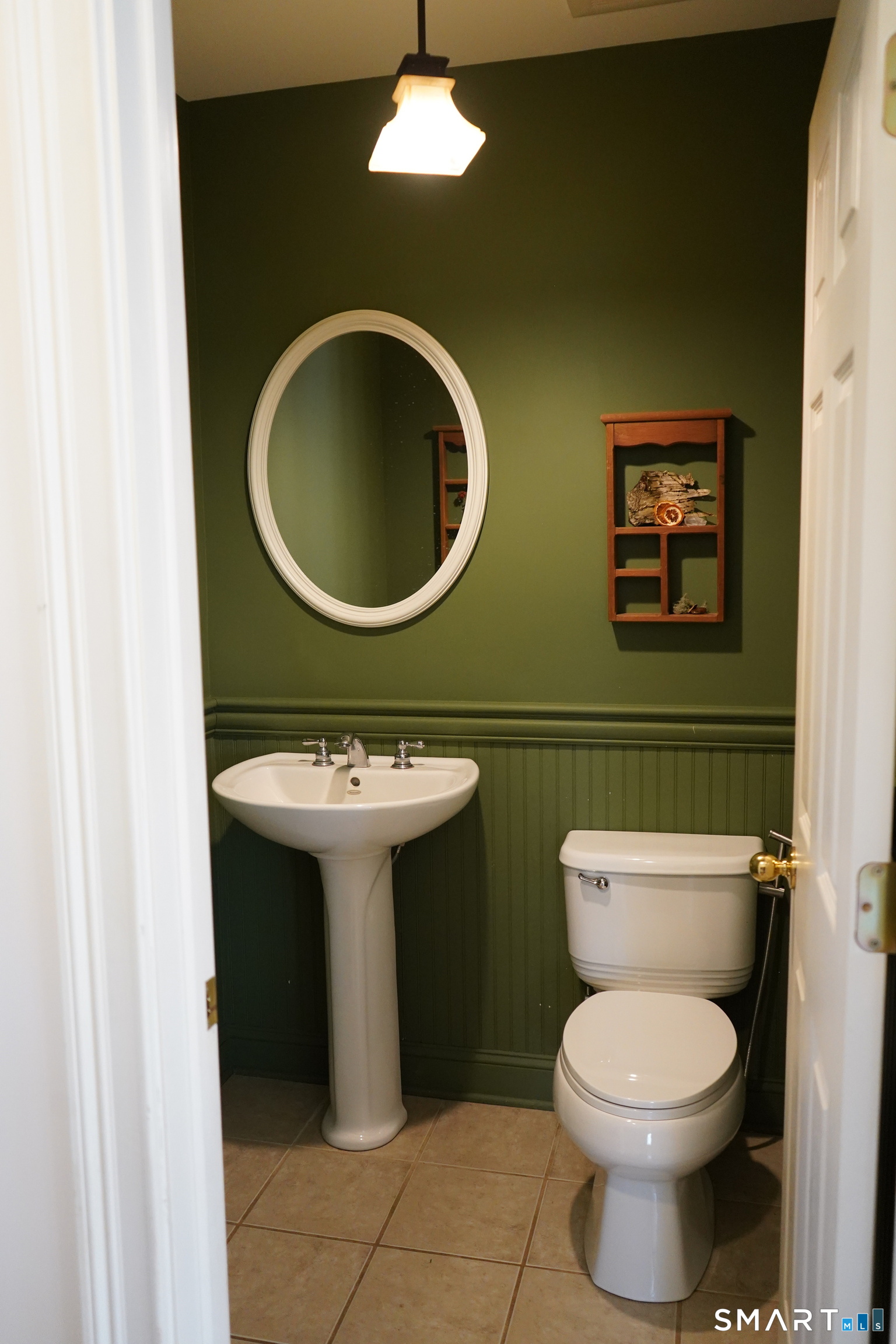 437 Providence Turnpike Hampton, CT 06247 - Photo 10 of 39 a bathroom with a toilet a sink and a mirror