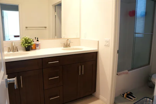 a sink with a mirror