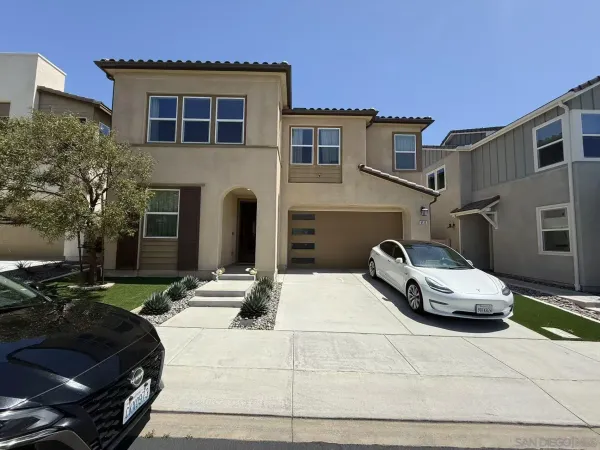 a car parked in front of a house
