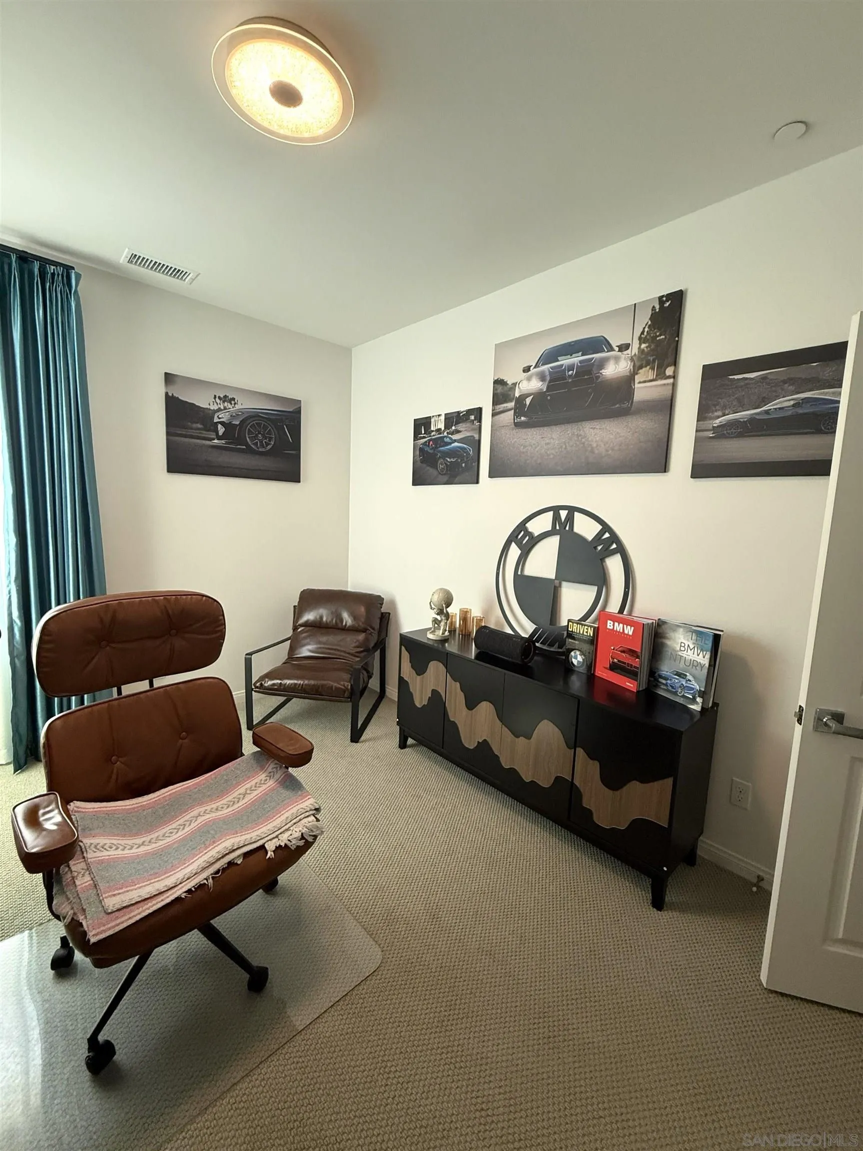 8515 Goldfield Street Santee, CA 92071 - Photo 6 of 34 a living room with furniture and a window