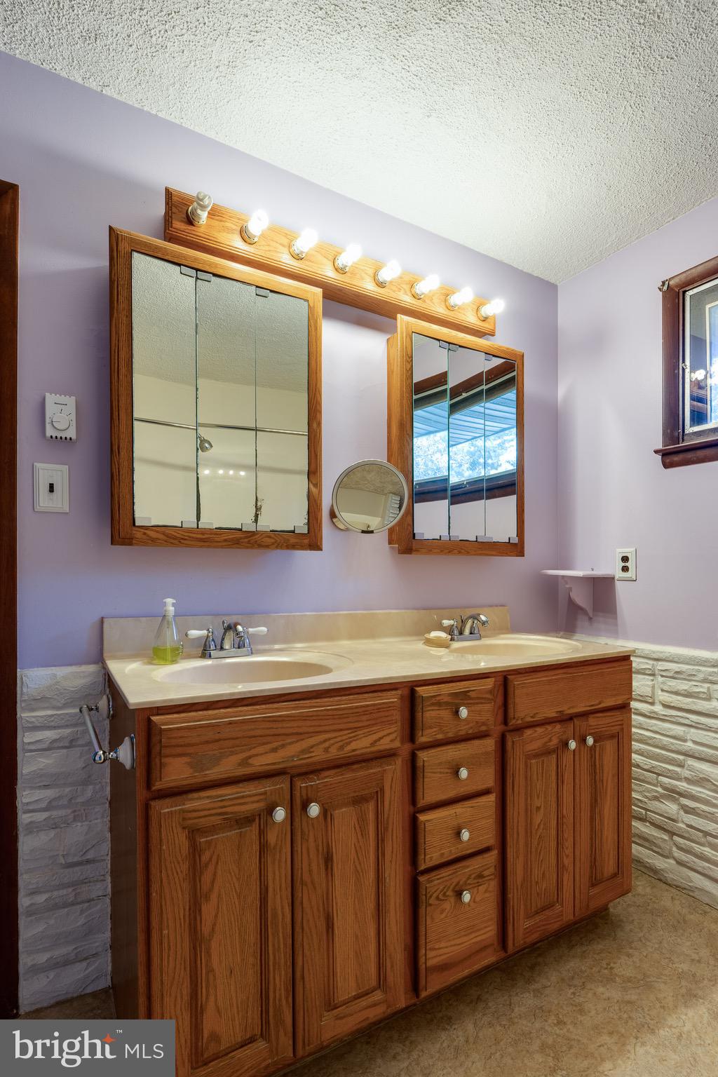 1111 Pennsy Road Pequea, PA 17565 - Photo 25 of 44 a bathroom with a sink and a mirror