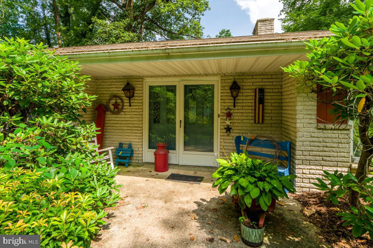 1111 Pennsy Road Pequea, PA 17565 - Photo 3 of 44 a view of a house with potted plants